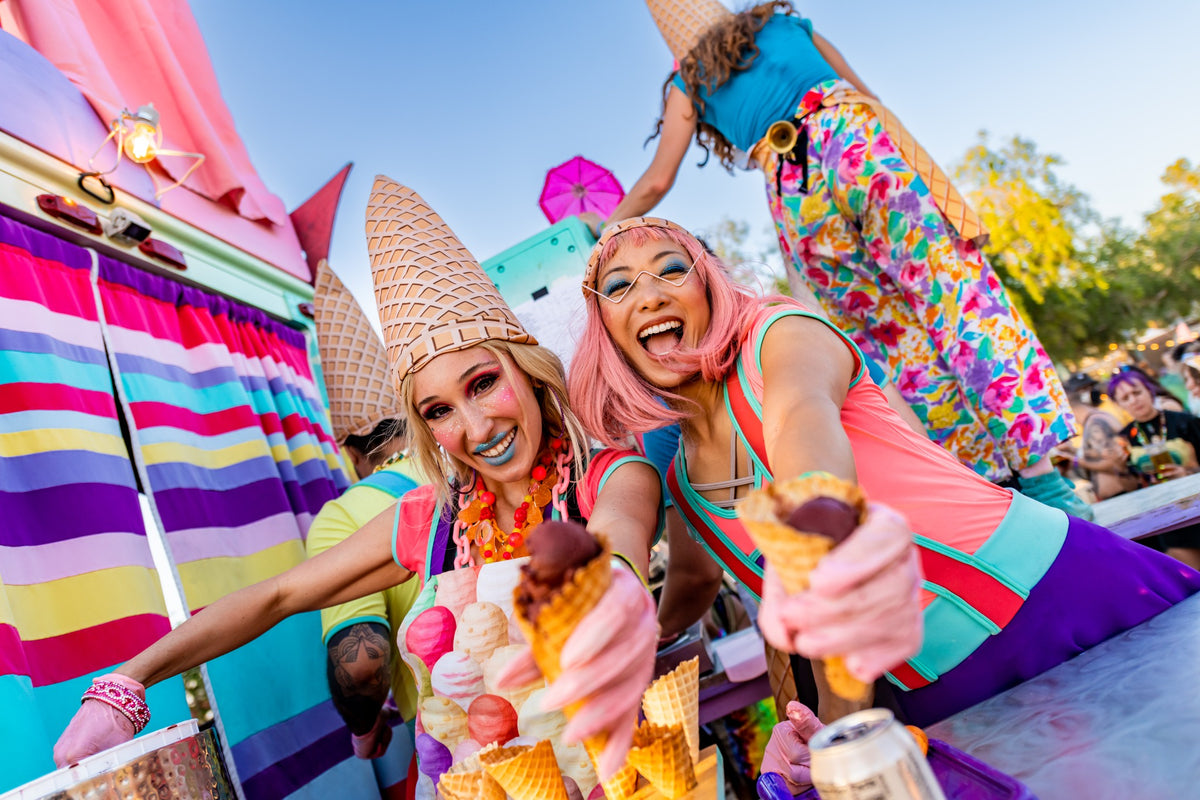 Festival-goers with ice creams